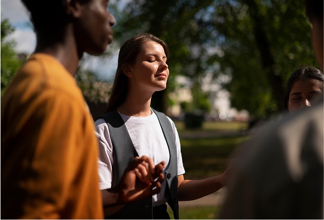 Clients in a guided outdoor mindfulness circle